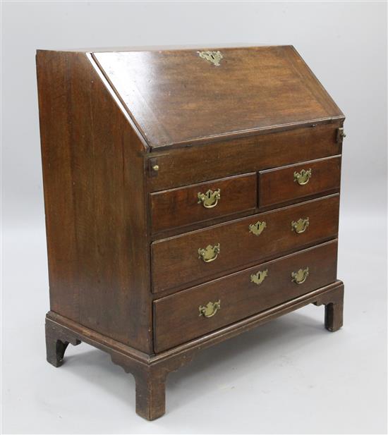 A George I oak bureau, W.3ft 2in.